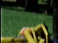 In the public park, I observed an amateur couple having sex.